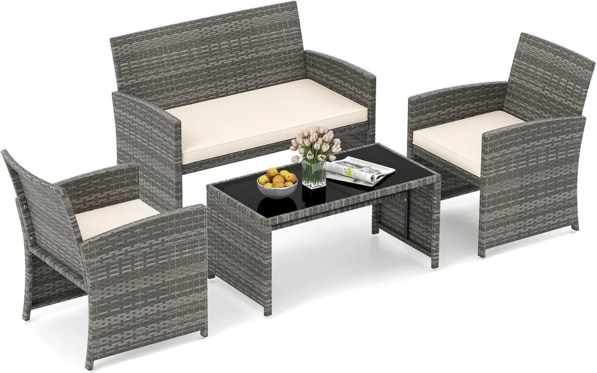 Set da Giardino in Rattan 4 Pezzi con Cuscini, Divano e Tavolo in Vetro